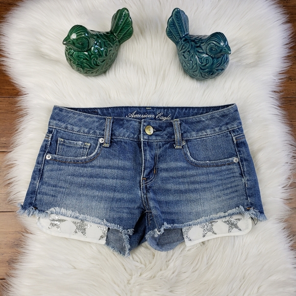 American Eagle Outfitters Pants - American Eagle sparkle star pocket  denim shorts size 0